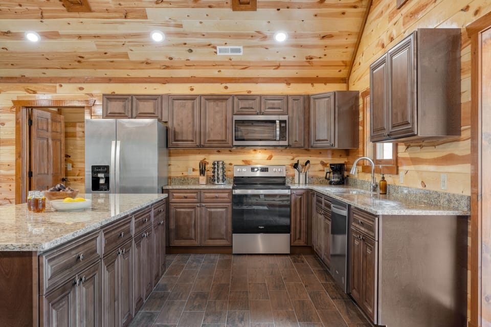 Modern kitchen appliances and tons of storage and counter space.