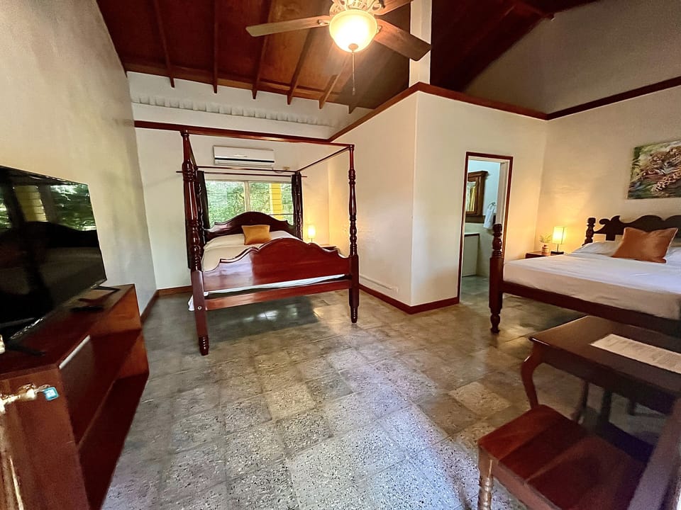 Premium Quadruple Room | Blackout drapes, iron/ironing board, free WiFi, bed sheets