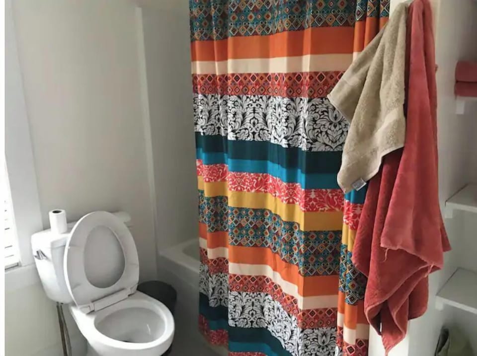 Shower in tub and toilet on first floor