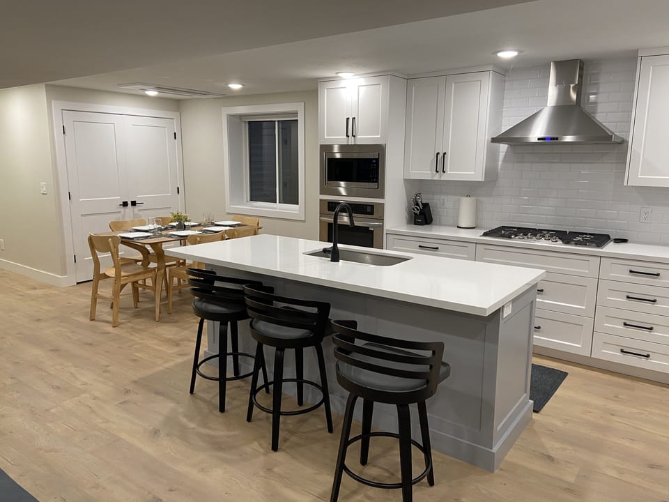 Kitchen with island seating for 3