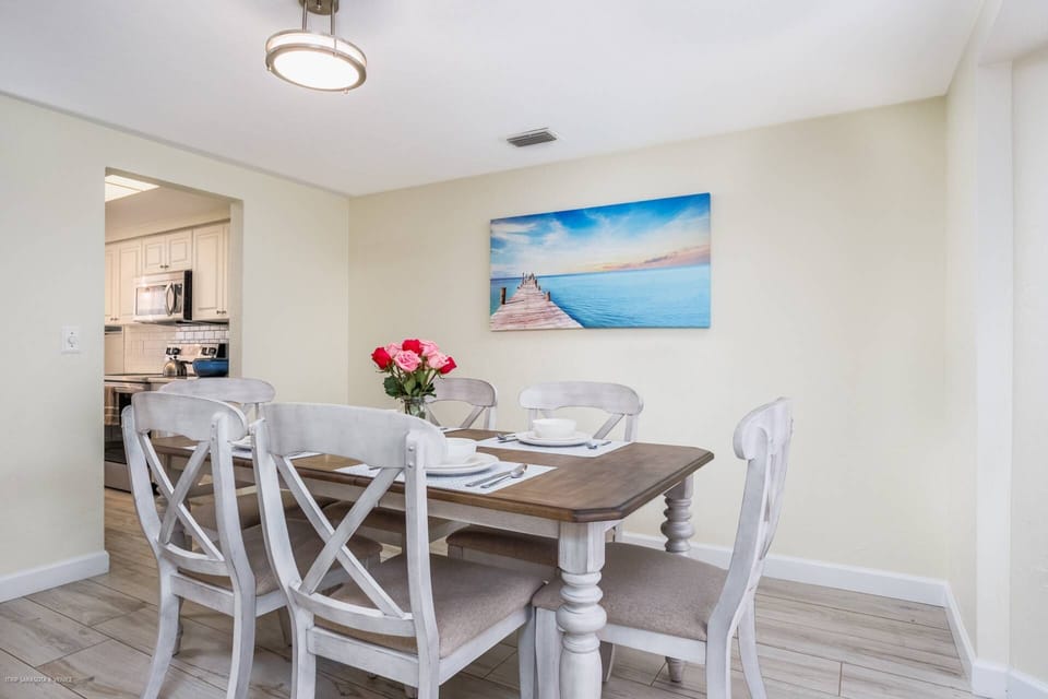 New dining table for 6 with comfortable, padded chairs.  Enjoy cooking homemade meals at home.