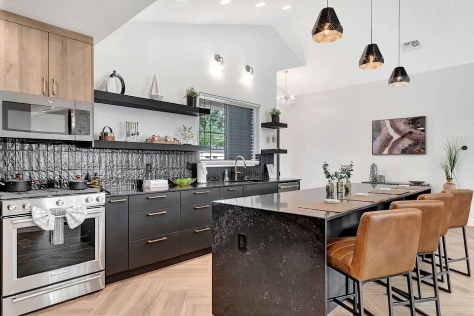 Stainless steal appliances, large kitchen island and bar seating for 4 people!