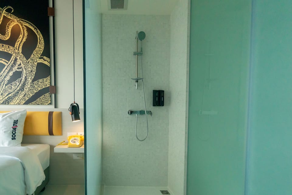 Shower, towels, shampoo, toilet paper
