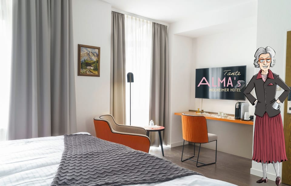 Basic Double Room | Living area | 45-inch flat-screen TV with cable channels