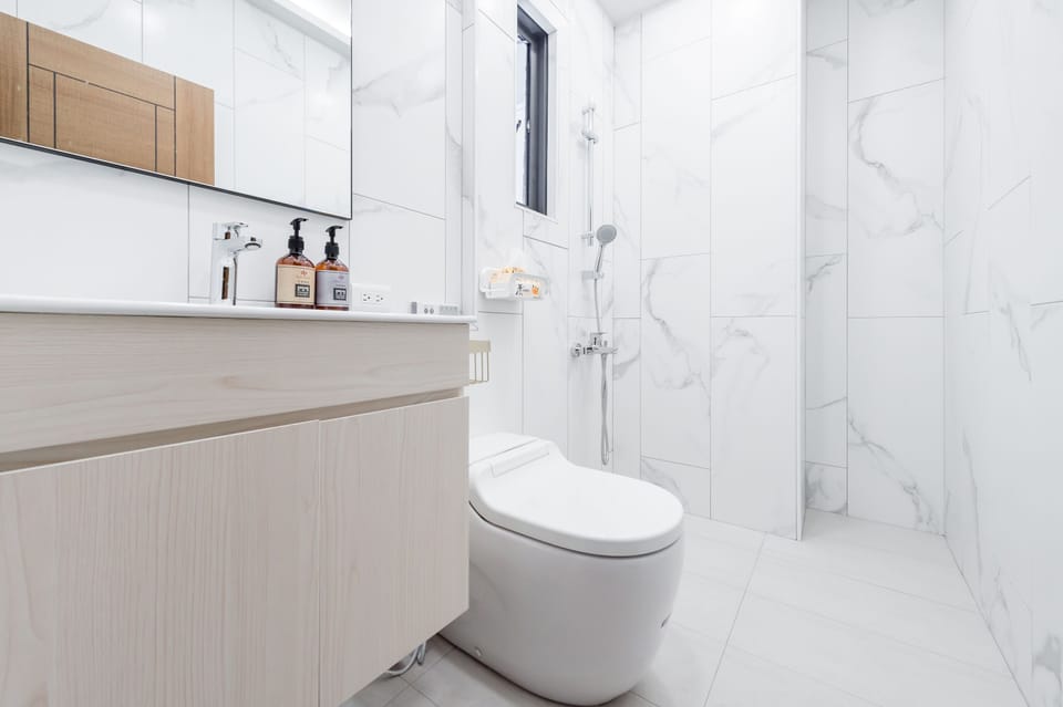 Japanese-Style Quadruple Room with Balcony | Bathroom | Shower, free toiletries, hair dryer, slippers