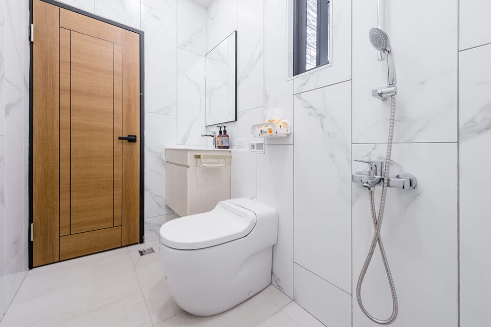 Japanese-Style Quadruple Room with Balcony | Bathroom | Shower, free toiletries, hair dryer, slippers