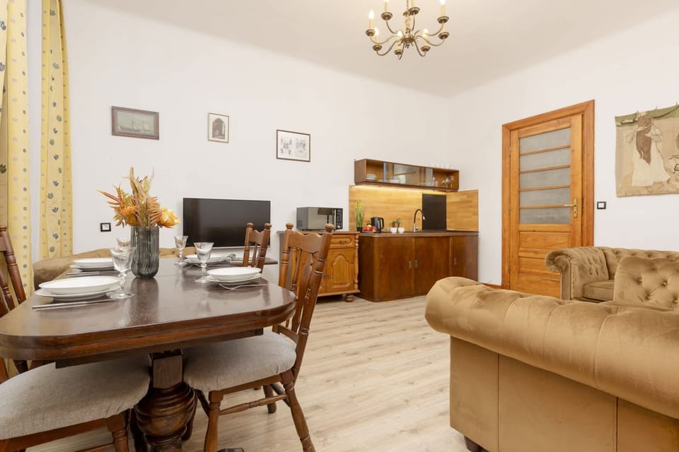 Large table with chairs for eating communal meals. 