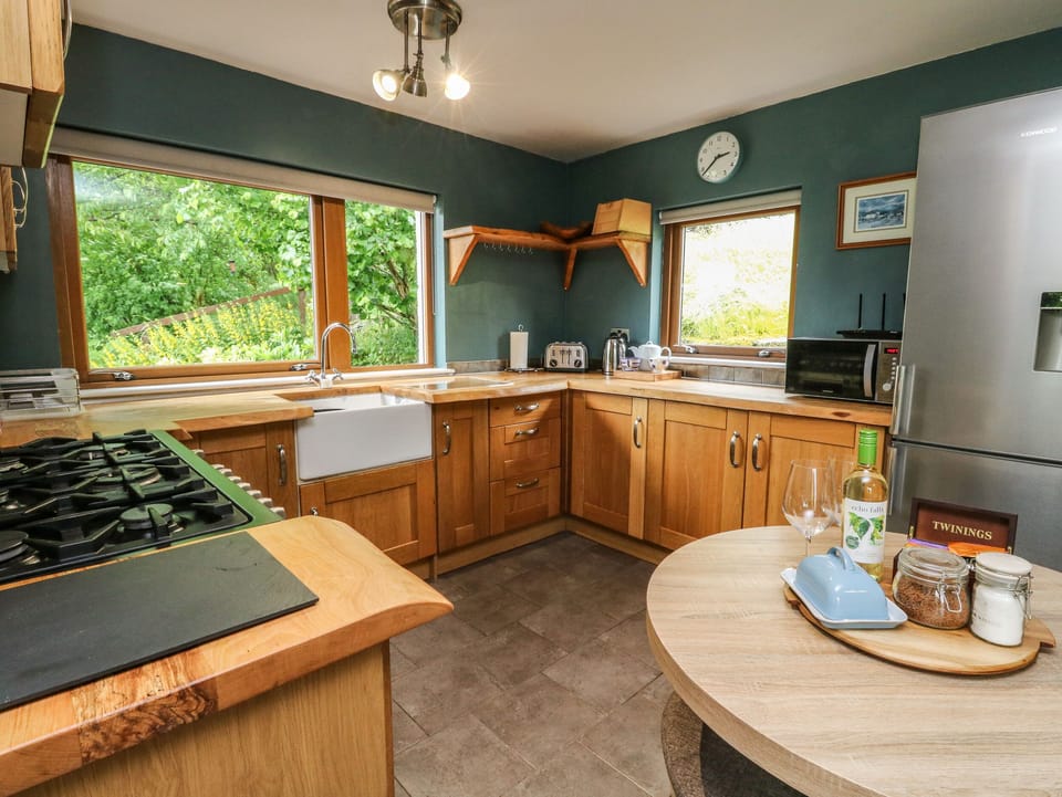 Fridge, electric kettle, cookware/dishes/utensils