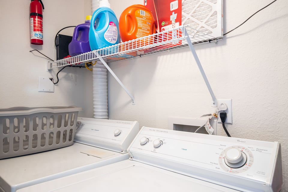 Washer and dryer with Laundry deturgent and softener supplied.