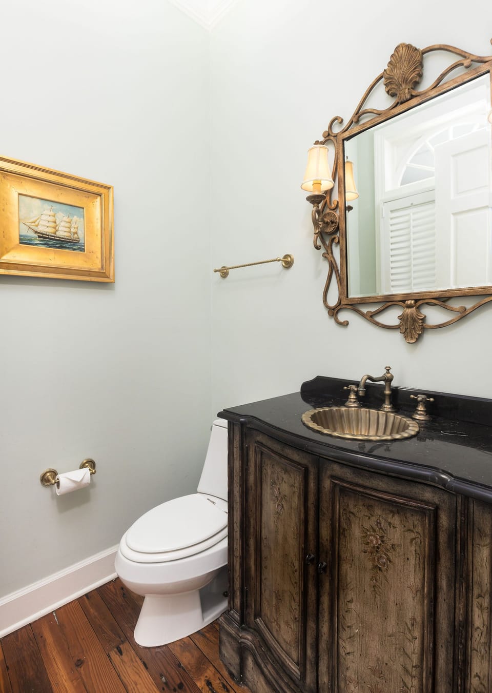 Gorgeous half bathroom located downstairs
