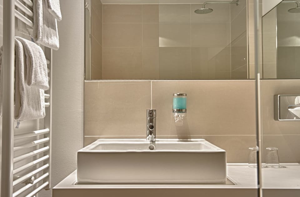 Hair dryer, towels, soap, shampoo
