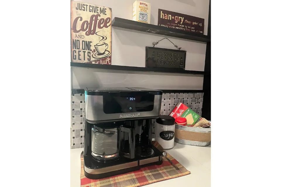 12 Cup Coffee Maker and K cup with Filters and Sugar provided.