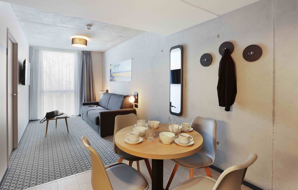 Sink into the cozy sofa after a day exploring the area.