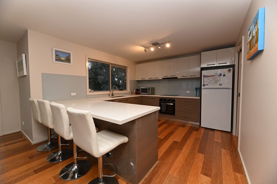 Large kitchen featuring Pod coffee machine, microwave, slow cooker and much more