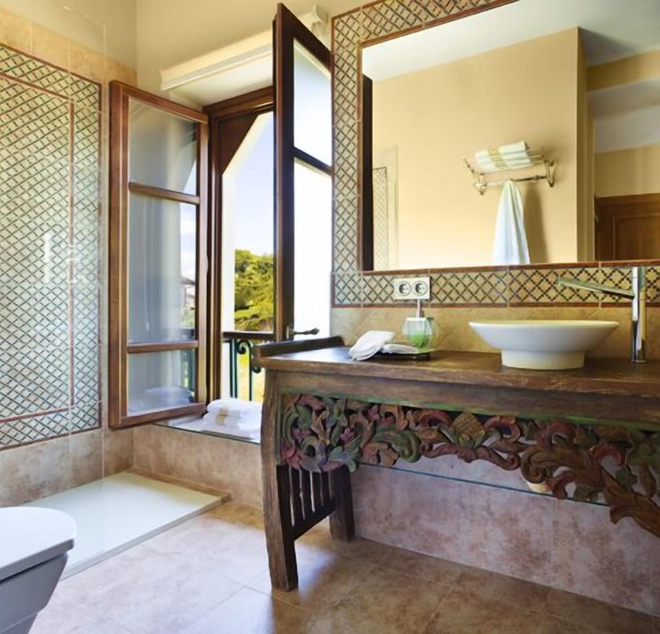 Shower, bathrobes, slippers, towels