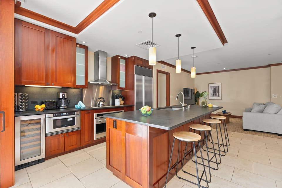 Spacious gourmet kitchen with high-end appliances and a large island perfect for gathering.
