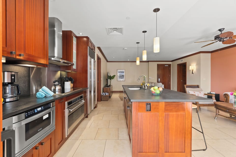 Spacious gourmet kitchen with high-end appliances and a large island perfect for gathering.