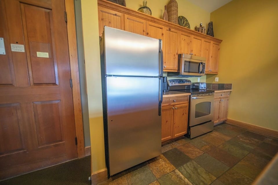 Fully equipped kitchen with stainless appliances