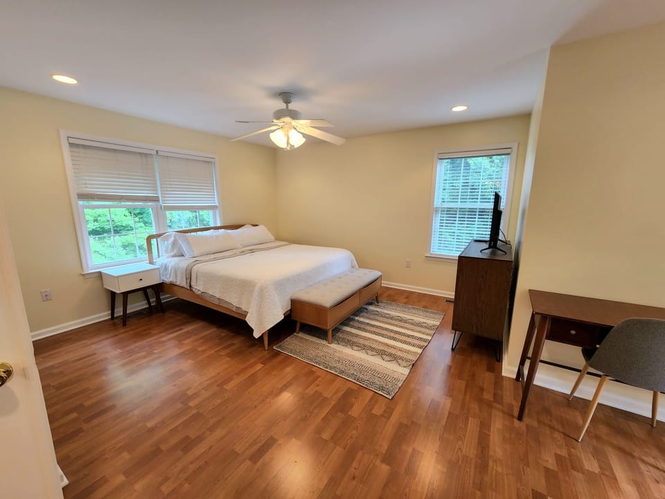 Spacious bedroom with king sized bed.
