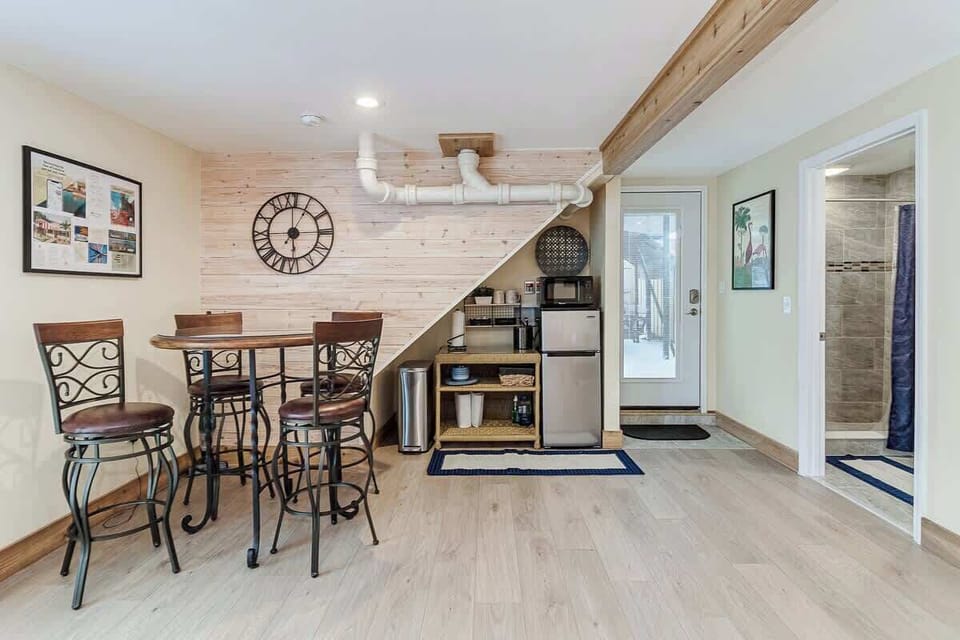 This space is equipped with a mini-fridge, microwave, mini coffee maker, and a small toaster oven for your convenience.