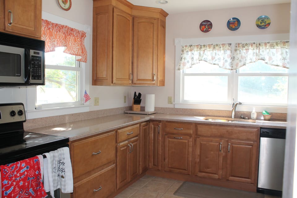 Kitchen with warm views out onto the creek.