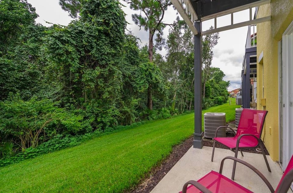 Walk out deck facing a wooded area for privacy - space to RELAX, just gorgeous!