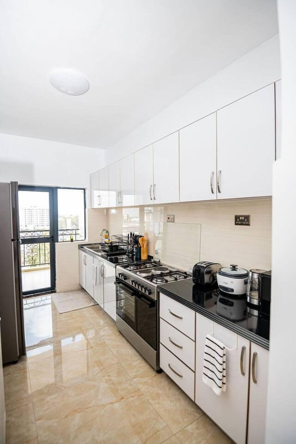 Apartment | Private kitchen | Fridge, microwave, oven, stovetop