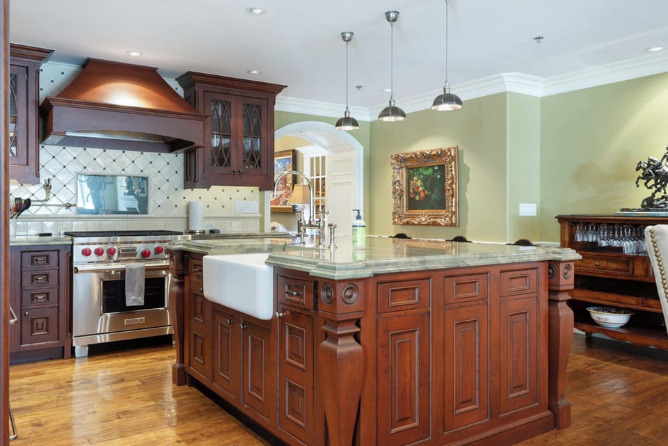 Huge, elegant, chef's kitchen with high-end appliances and finishes throughout