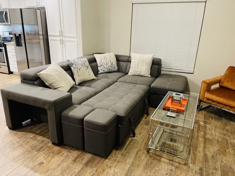 Living room couch opens up into bed 