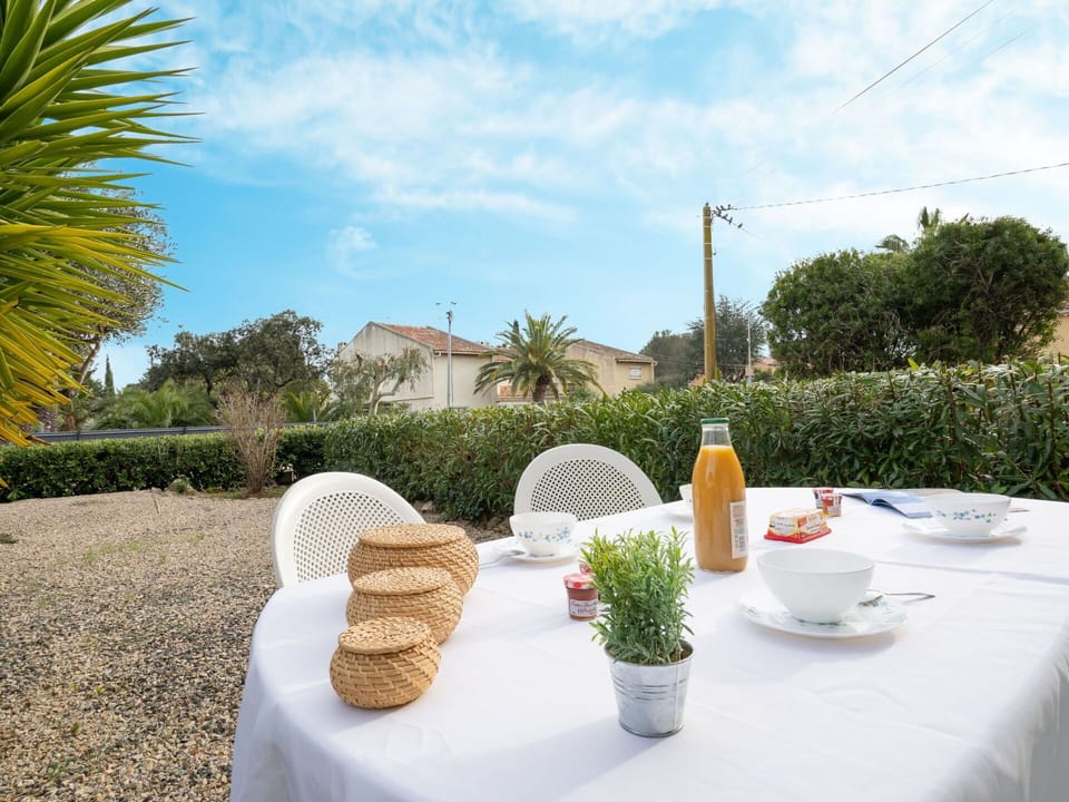 Plant, Cloud, Sky, Table, Tableware, Property, Flowerpot, Building, Tree, Outdoor Furniture