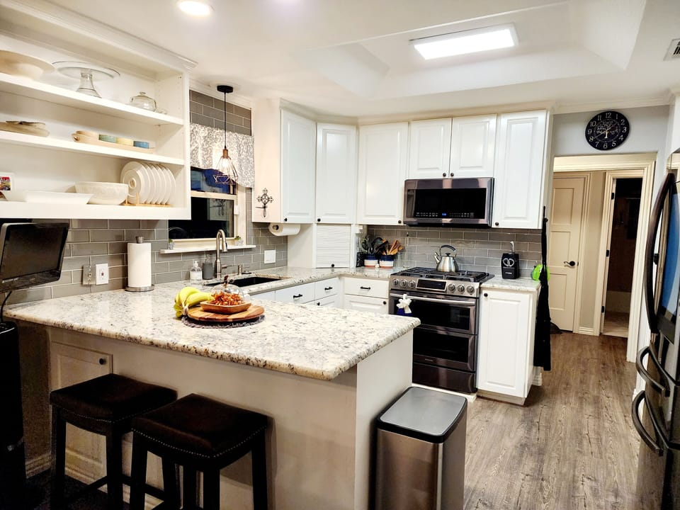 Kitchen with lil bar seating