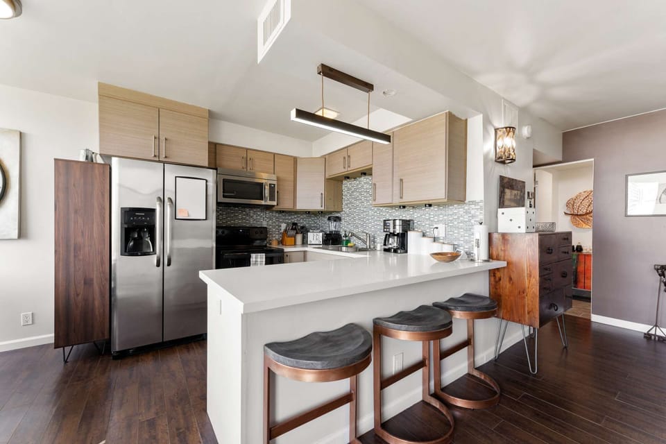 Gather around the kitchen bar with three stylish and comfy chairs