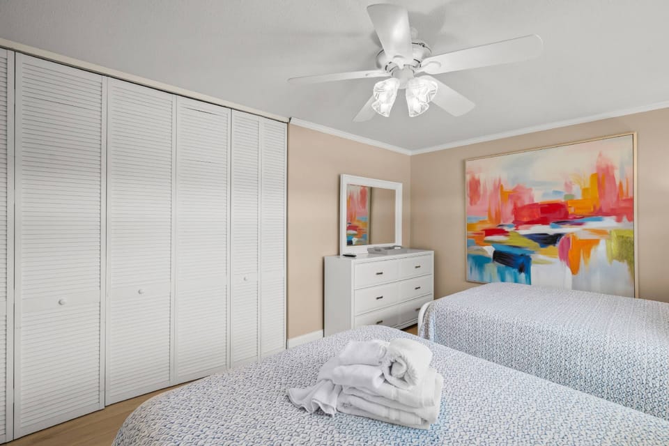 Cozy linens and a well-appointed bathroom—vacation ready