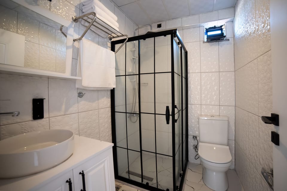 Junior Suite, Balcony, Sea View | Bathroom | Shower, hair dryer, towels