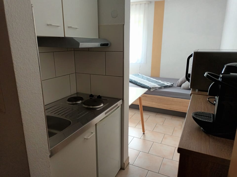 Business Studio | Desk, blackout drapes, iron/ironing board, free WiFi