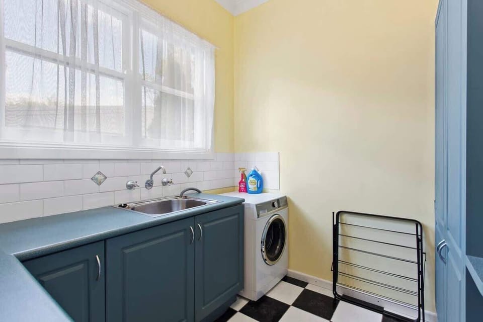 Laundry with washing machine and storage space