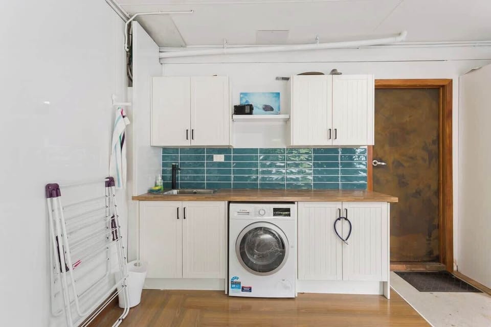 Garage, with access for one car, Washer Dryer combination and dry rack for the washing