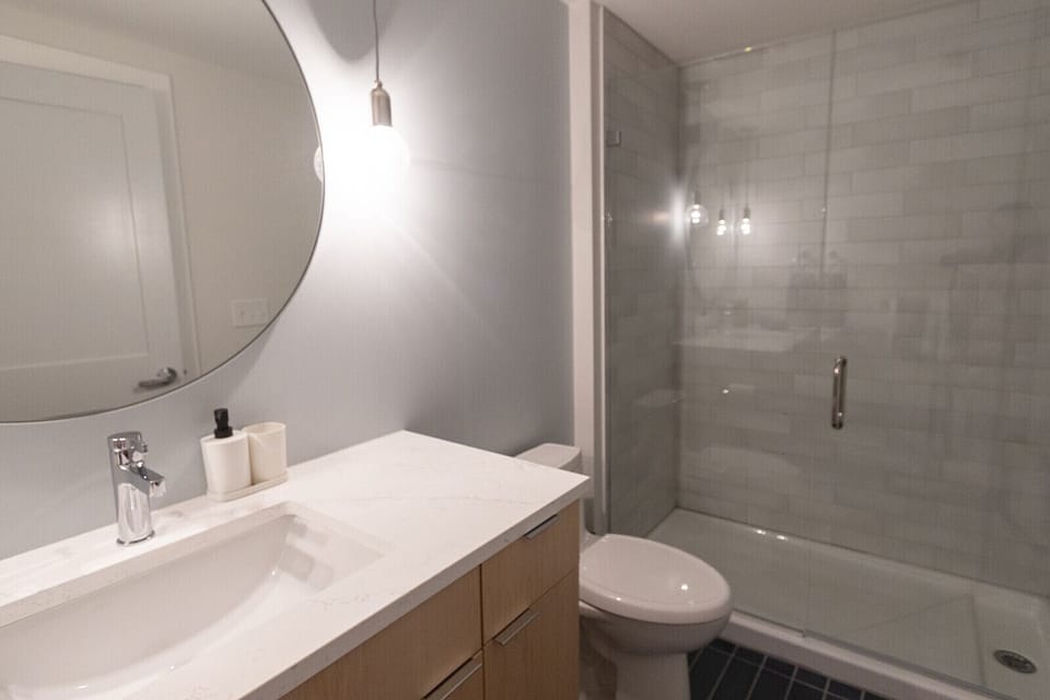 2nd Bathroom with glass shower door.