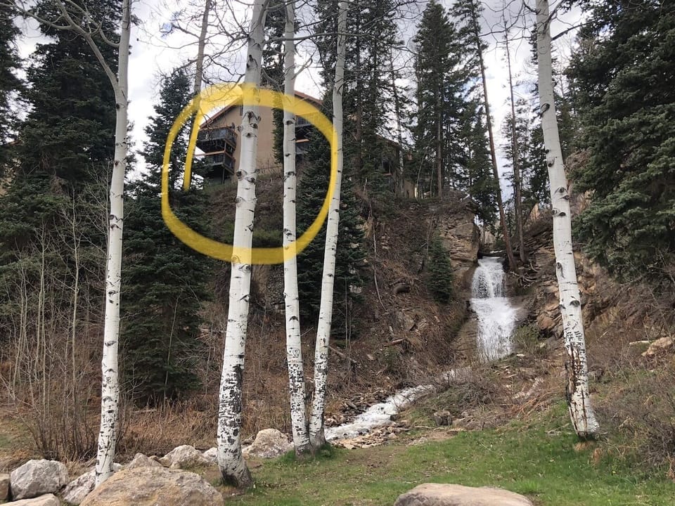 Our place from below. Yes that is a real waterfall!