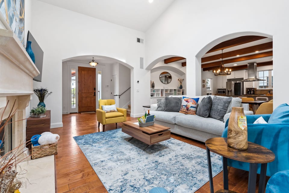 Living room- comfy couch and arm chairs for Netflix and chill.