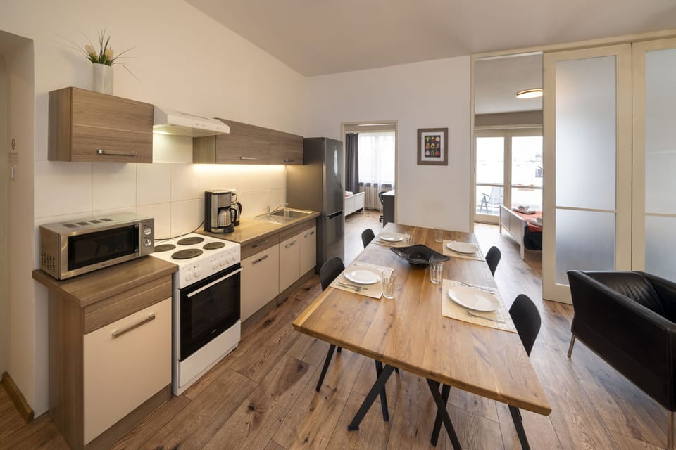 Living room with kitchenette and large dining room