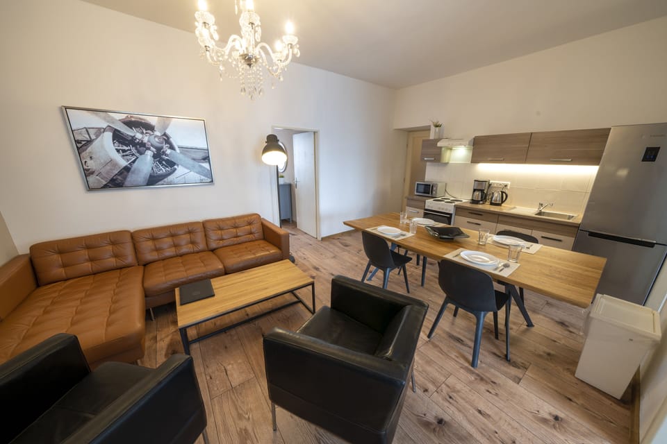 Living room with kitchenette and large dining room