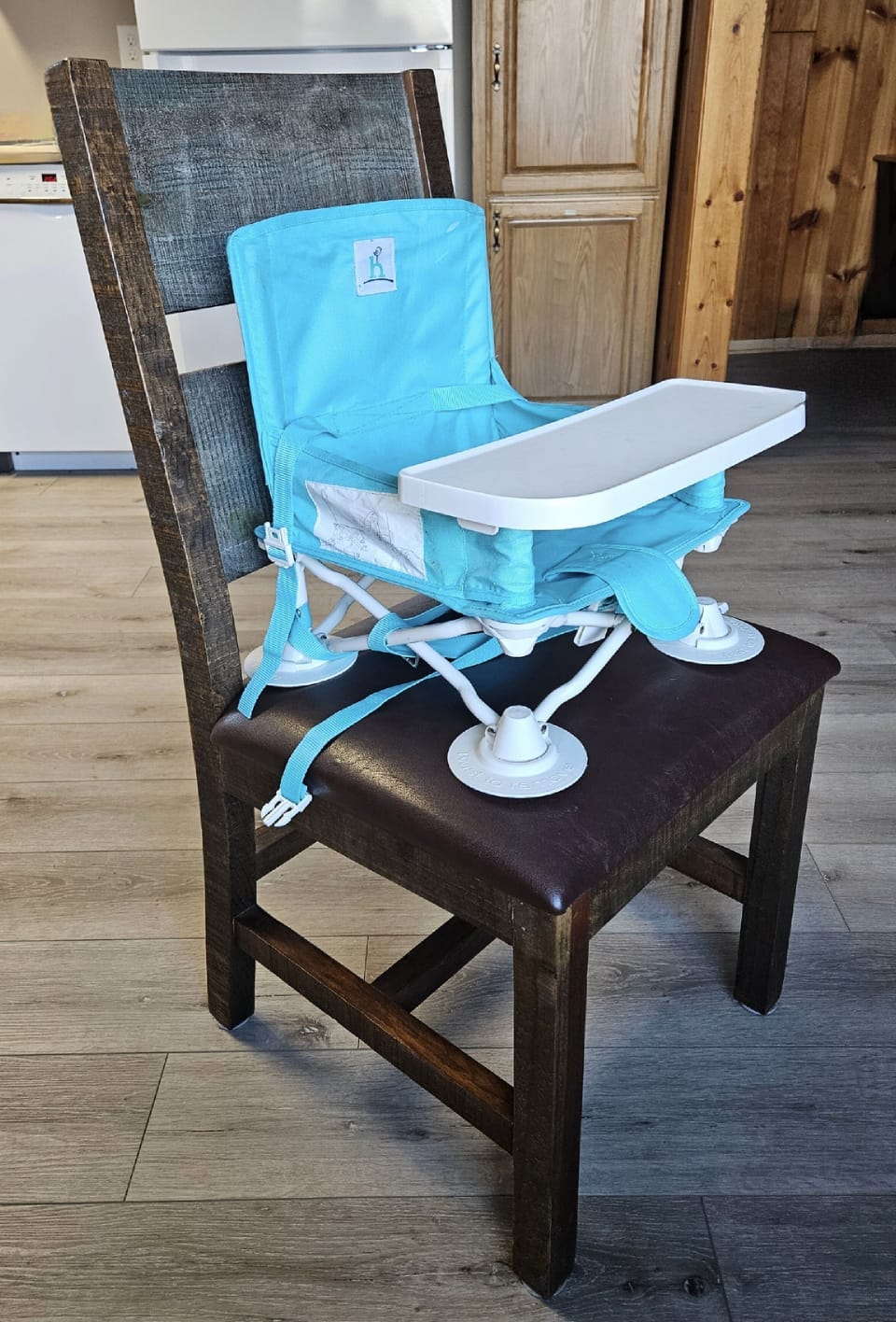 Baby seat available to strap onto chair!
