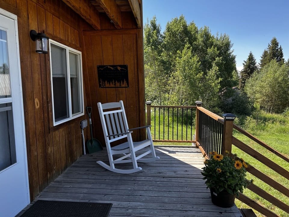 Deck out front to enjoy the view across Henry’s Lake State park.  
