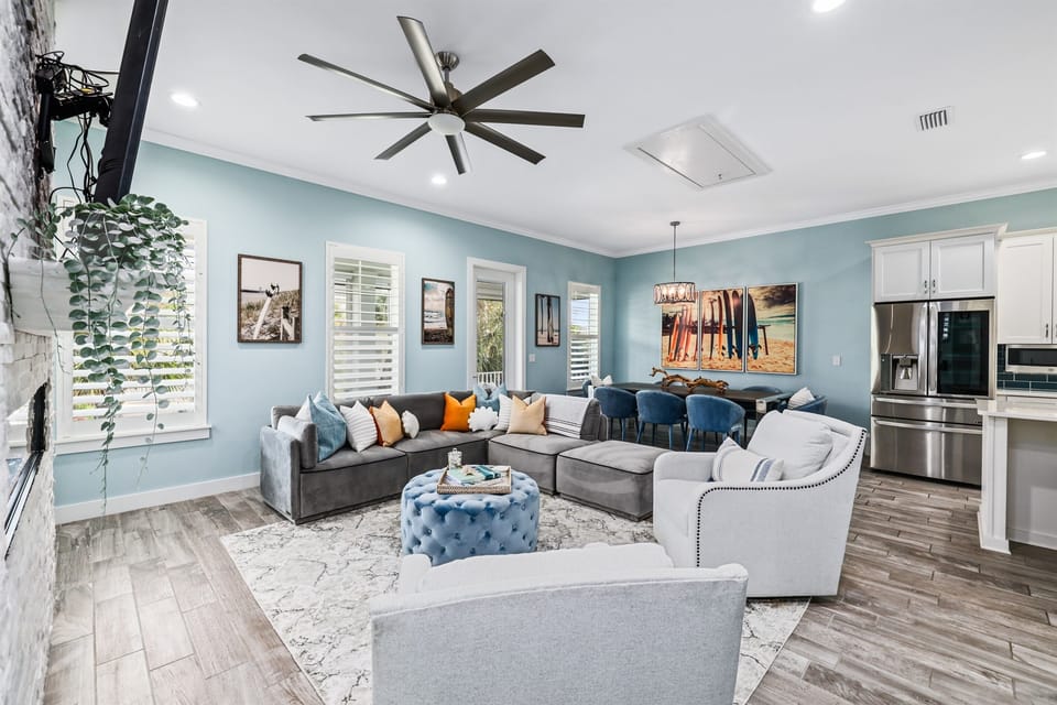 Airy main living space with plenty of natural light and room for the whole group to gather.