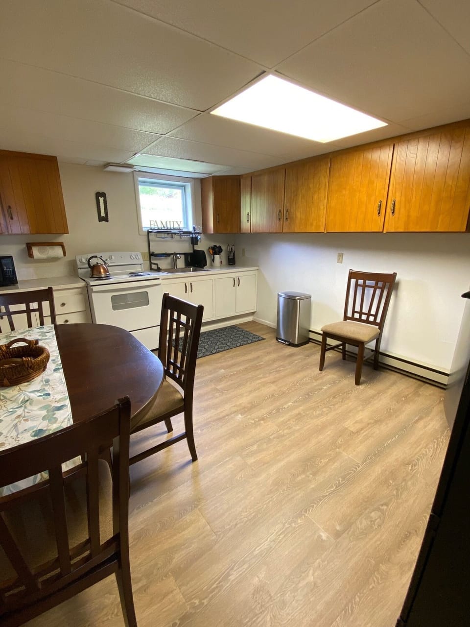 Downstairs mini-kitchen, fridge, stove, coffee pot, toaster, microwave, blender,