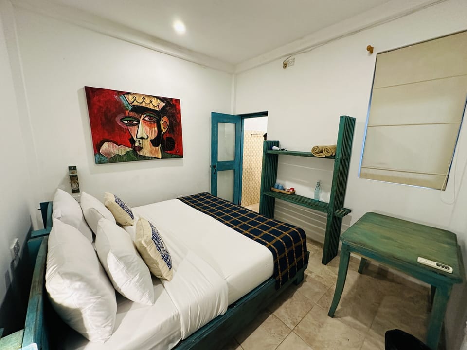 Moi Double Room | Blackout drapes, iron/ironing board, bed sheets