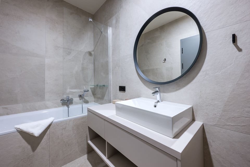 Designer toiletries, hair dryer, slippers, heated floors
