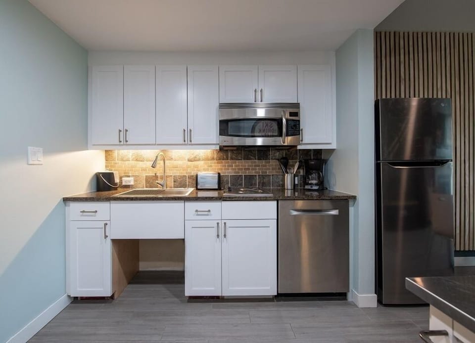 Condo, 1 Bedroom | Private kitchen | Oven, coffee/tea maker, toaster