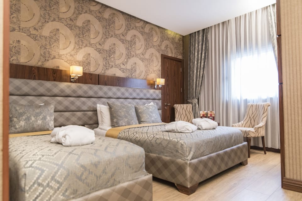 Premium bedding, minibar, in-room safe, laptop workspace